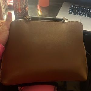 This is a Bolvaint the Patrice tote. It’s a small tote bag which has 3 pockets